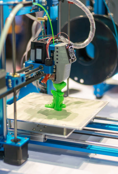 Servicios de impresión 3D; acercamiento al diseño de una pieza en color verde