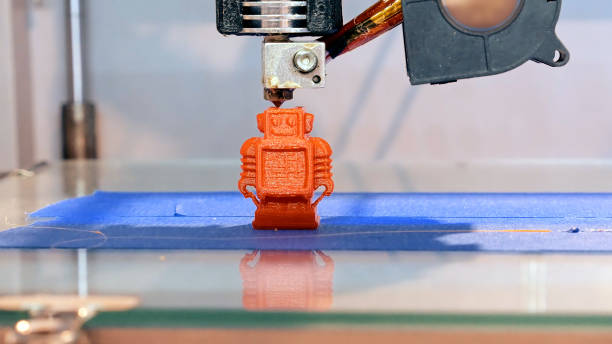 impresión en resina; máquina de impresión 3d imprimiendo un robot 